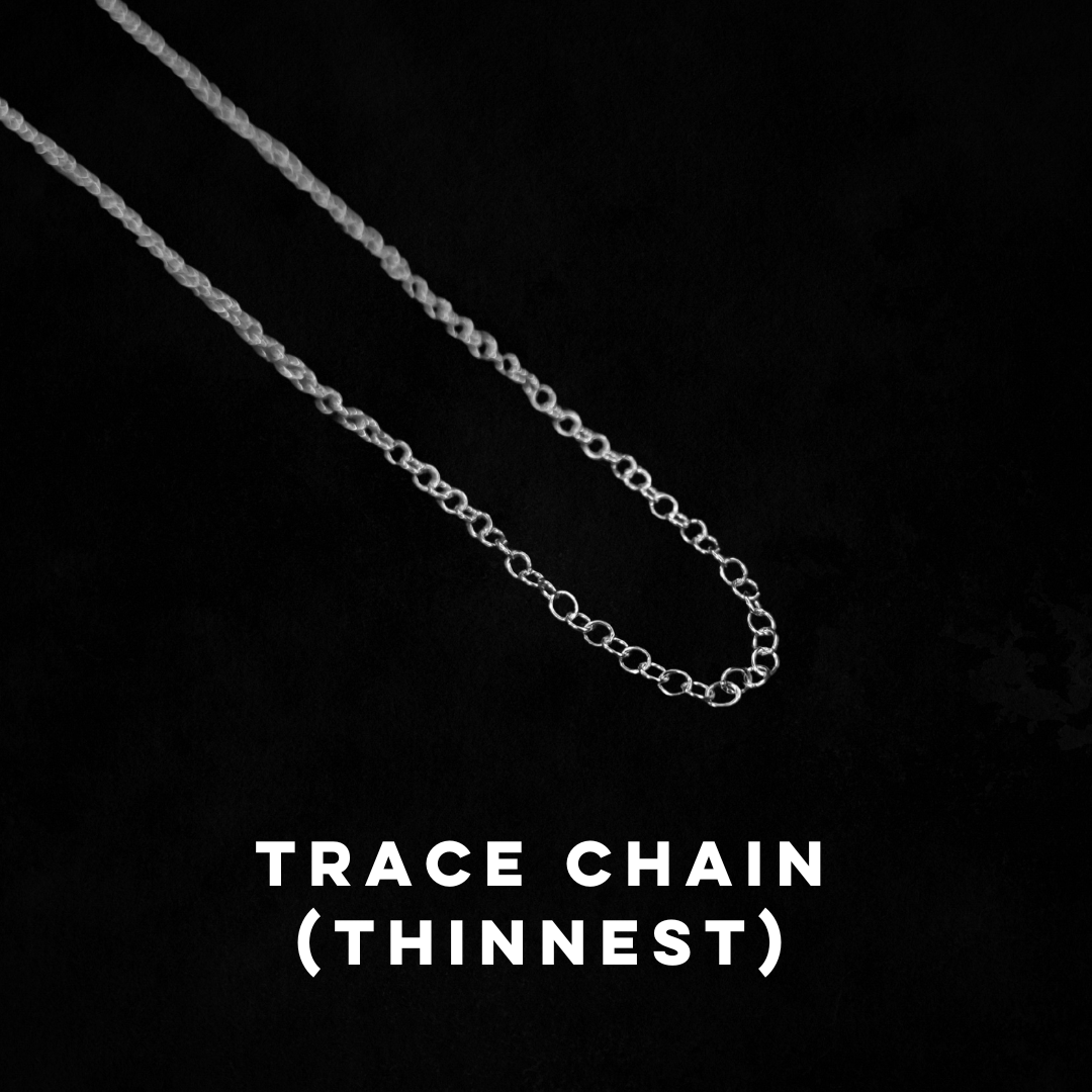 A thin trace chain is laid on a black background.
White text, in all capitals, says "TTRACE CHAIN (THINNEST)".