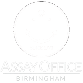 White logo for the Birmingham Assay Office with the regional anchor hallmark symbol.
